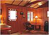 Full kitchen and private bedroom. River Rock fireplace. Craftsmanship throughout.