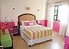 Juanita #3 second bedroom with queen and private bathroom