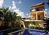 Large, airy, comfortable 1 bdrm apt with partial ocean view