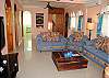Casa Mae family room with large screen TV and DVD.