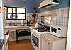 Juanita #3 kitchen with larege stove