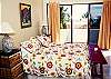 Queen bed and lovely view of the ocean.  Large closet.  Shared bathroom with other bedroom on this floor.