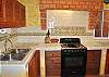 New stove and sink.  Paint touch up done after the photo was taken.