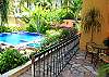 You will have your own separate patio and a lovely view of the pool.
