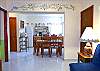 Hand painted wall decoration adds Mexican flare to cute first floor unit.