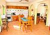 View from the entrance door of the kitchen and living room area.