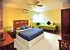 Large bedroom with  queen and single bed.  Private bathroom.