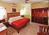 Large bedroom with king bed, large closet and private bathroom.