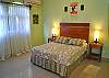 1st floor bedroom with queen bed