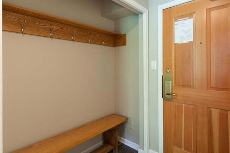 Entry with area to hang ski gear
