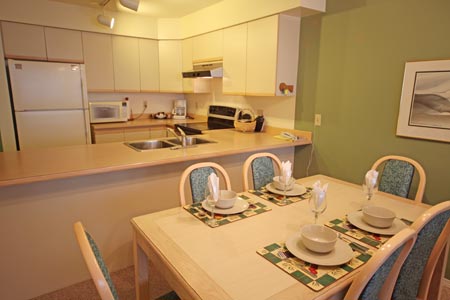 Full kitchen and dining area