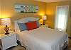 Bedroom with queen size bed.