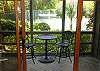 Views from living area towards screened porch.