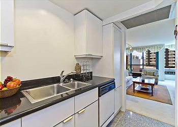Kitchen with Living Room in the Background