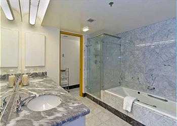 Master Bath with Jetted Tub and Marble Tile