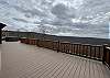 The large and spacious wraparound deck overlooks the valley and has views for miles. Outdoor seating is available during the Summer months.