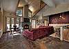 Living room with game table and views of Squaw Valley USA