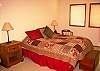 Tastfully decorated bedroom with a queen