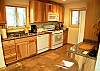 Kitchen with Granite Counters and Stone Flooring