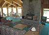 Living Room with Fireplace and Large Windows