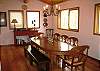 Dining area with bench seating and chairs for 9+!