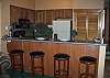 Bar seating for 4 in addition to the dining room table that seats 4