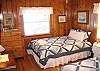 Bedroom One with two Queens and lakeview