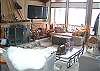 Living room with fireplace, Plasma TV, and plenty of seating