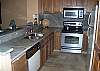 Well equiped kitchen with stainless steel appliances