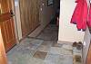 Granite flooring in the entryway make for easy clean up!