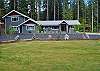 Great grass area for yard games! Paved circular driveway.