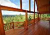 Huge, covered main floor deck with big views in every direction!  Great spot for wildlife viewing or just lounging with friends and family!