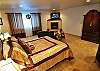 One of two Master Suites with private Kitchens, Gas Fireplaces, Flatscreens and full bathrooms!