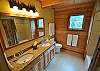 Main floor bathroom with double sinks and a shower/ tub!