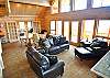 Very comfortable leather furniture around the massive ledgestone wood burning fireplace!