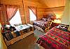 Upper floor bedroom with a Queen and 2 Twins.