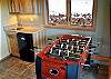 Foosball Table and Wet Bar!  Keep your drinks cold in the fridge while you play a lively game of Air Hockey or Foosball!