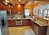 Chef's Kitchen with stainless appliances and granite counters!