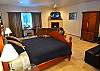 One of two Master Suites with private Kitchens, Flatscreens, Gas Fireplaces and full bathrooms.