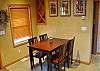 Dining table for 6. Additional dining at the Kitchen Bar.