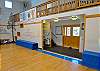 Main entrance to the gym! Blue gym mats make great sleeping pads for the kids.