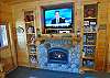 50" Flatscreen TV with Satellite, DVD, VHS, and some videos.