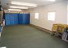 One of the two garages can be used as a mess hall for large groups. The garage has portable heaters, folding chairs and tables.