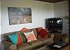 Another living room view with a heartwarming picture of Shutterbug owner's photography works.