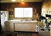 Plenty of work space in the kitchen and large ocean view windows to enjoy the view while you prepare your meals or wash the dishes.