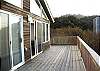Newly built "Trex" decking provides a non-slip surface deck.  Plenty of outdoor deck furniture and gas grill BBQ for summer enjoyment.