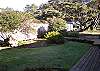 Beautifully landscaped yard provides a nice grassy area on the east side yard as well as the west + flowering shrubs and trees that are lovely in the Spring and Summer.