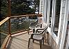 Enjoy the tranquil ocean breezes as you relax on one of the many decks of this lovely home.