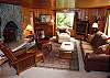 Comfortably furnished and tastefully decorated, this spacious living room provides a wonderful gathering place to relax and visit with your guests.