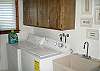 You'll enjoy the convenience of the laundry room & deep wash tub just off the kitchen.
